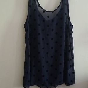 Sheer polka dot tank top.